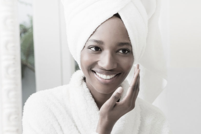 Young woman face in spa robe for medical spa page