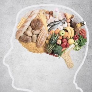 Outline of person head with healthy food filling the brain