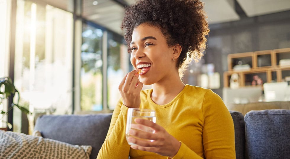 woman taking oral peptides in North Shore, IL
