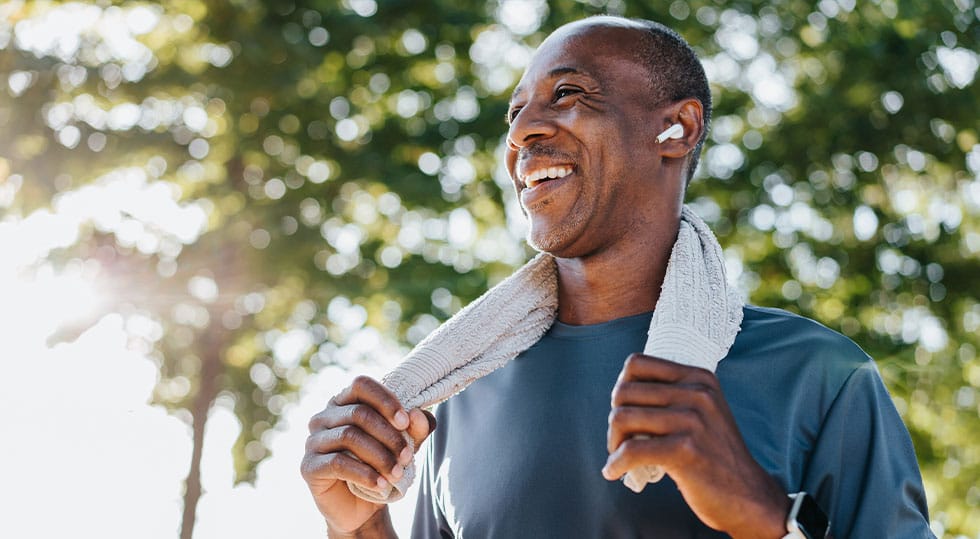 man smiling after starting peptide therapy in Deerfield, IL